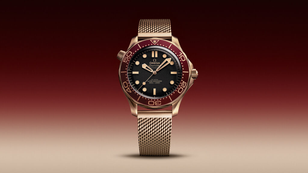 Omega, tra bronzo, oro e borgogna